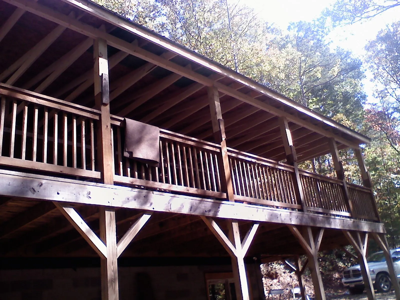 Timber framing under a new elevated porch and deck — Roof Leak Repair in Flanagan by Roofing Brothers